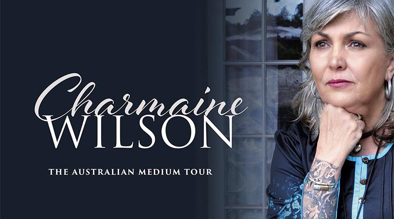 lady with grey hair looking off into distance with chin on fist - words Charmaine Wilson The Australian Medium Tour to the left of a deep grey - blue background with white text